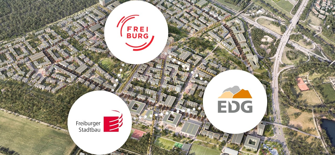 Luftbild des neuen Stadtquartiers Dietenbach in Freiburg mit markierten Partnern Stadt Freiburg, EDG und Freiburger Stadtbau